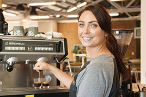 Local Barista Fills Cups and Hearts